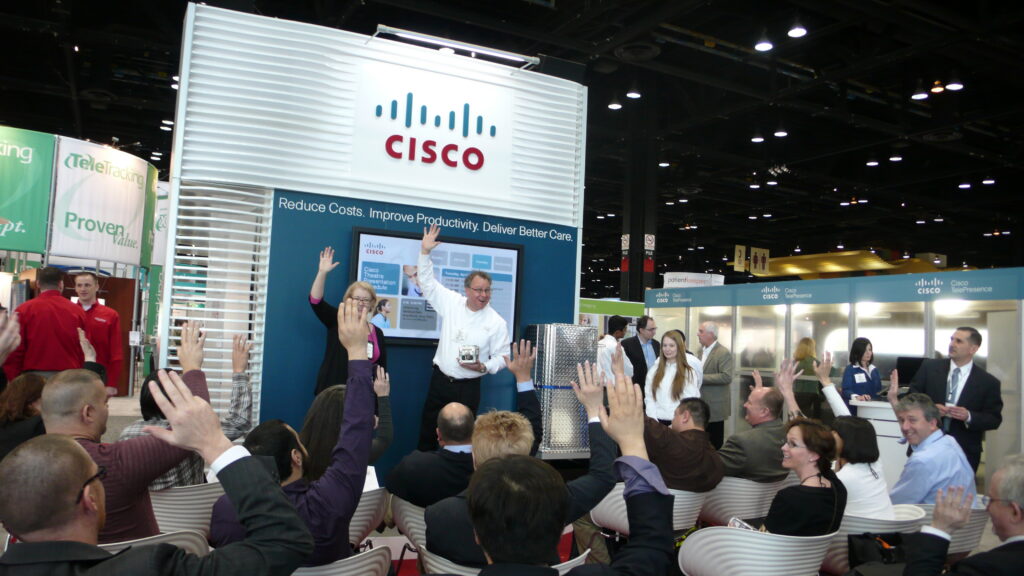 Trade show mentalist in a business theater presentation on a trade show floor
