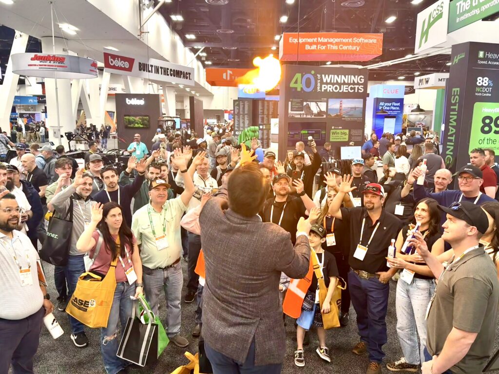 Las Vegas trade show magician at the Las Vegas Convention Center attracts huge crowds to the booth.